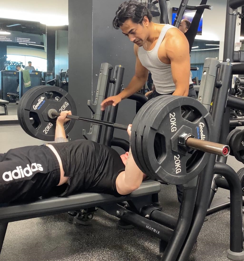 Me bench pressing 140kg at the gym